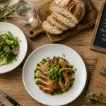 restaurant la table des bons vivants sainte luce nantes : table dressée avec assiettes et salade